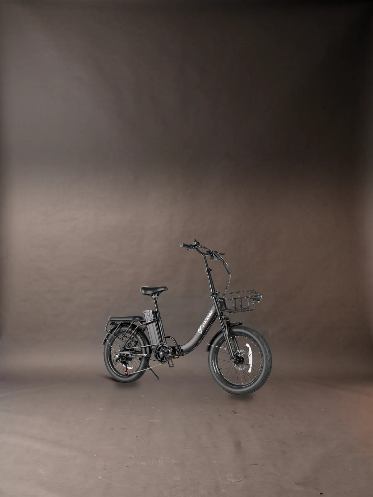 Lectric XP Lite 2.0 review: the folding e-bike we sell beside it, the Samebike CY20 Pro in Black, standing in a charcoal photo studio