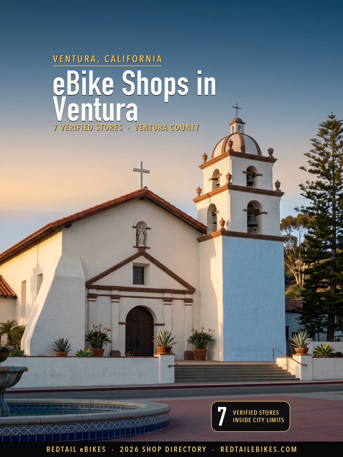 Cover reading eBike Shops in Ventura, 7 verified stores, Ventura County, over the church of Mission San Buenaventura, a whitewashed gable and a square bell tower with a ribbed dome, in early-evening light