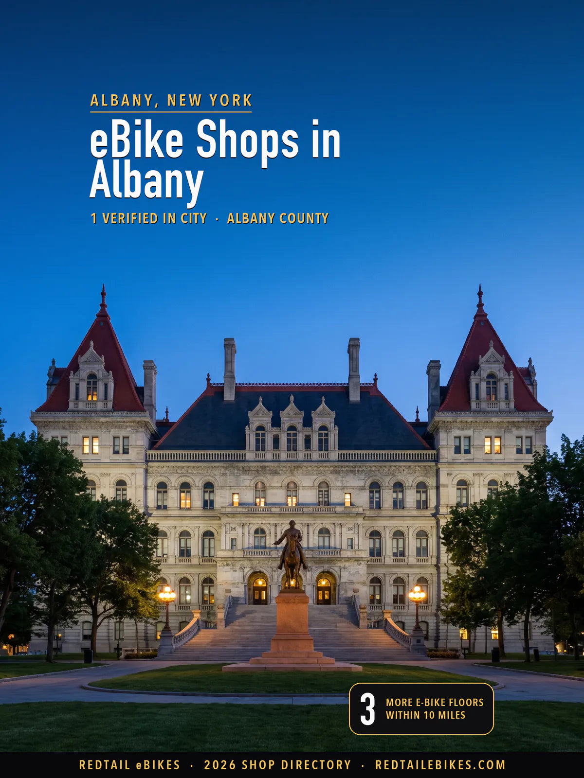 Cover reading eBike Shops in Albany, 1 verified in city, Albany County, over the New York State Capitol at blue hour, a granite chateau of red-roofed corner towers and gabled dormers floodlit warm over its east steps, the Sheridan statue on the axis