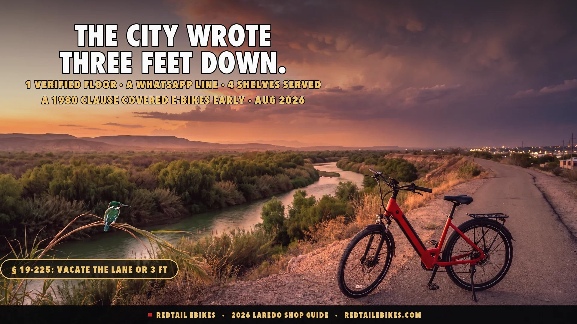Red step-through electric bike on the Zacate Creek linear park path above the Rio Grande valley in Laredo Texas at dusk with a green kingfisher on a reed and the river haze beyond
