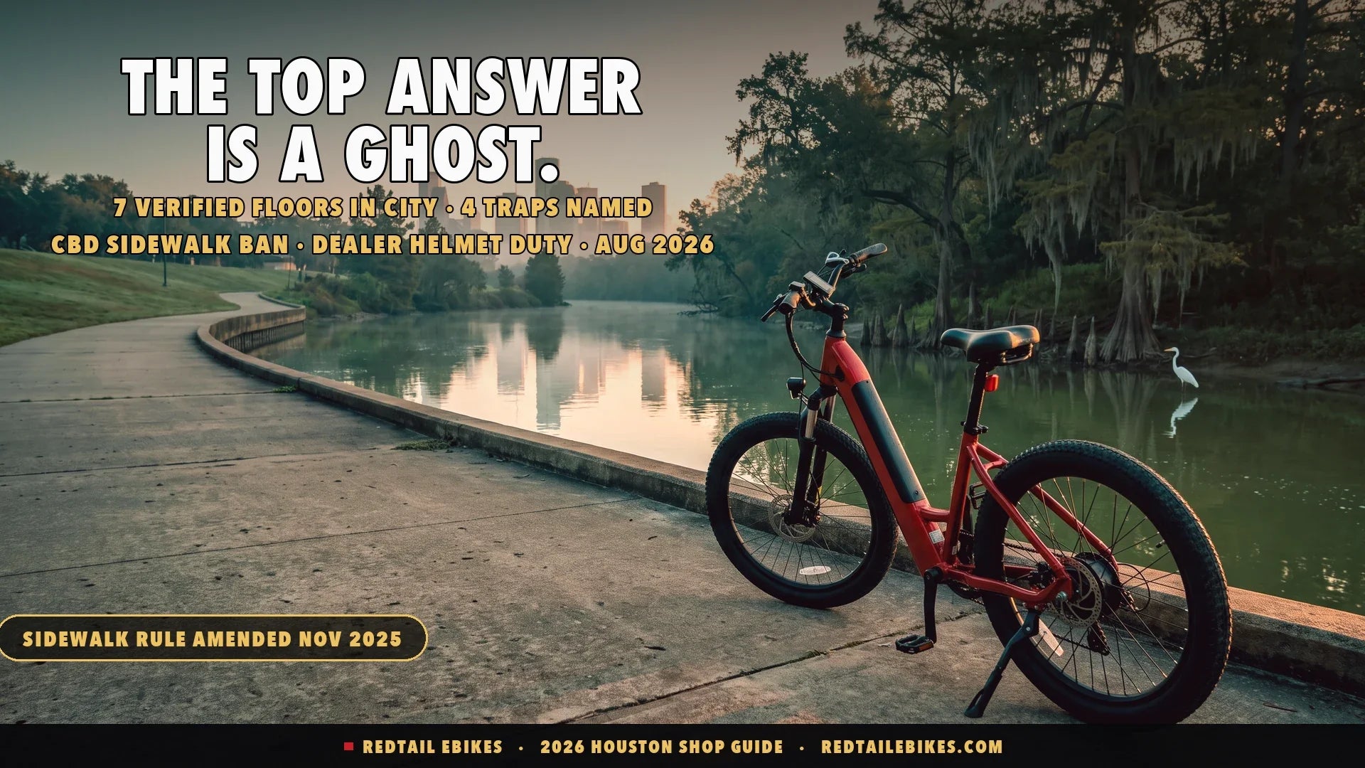 Red step-through electric bike on the Buffalo Bayou trail at dawn with the Houston skyline in morning mist