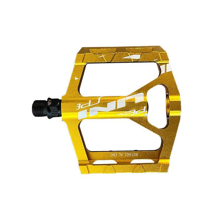 A yellow VTUVIA pedal, underside