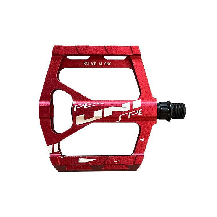 A red VTUVIA pedal, top view
