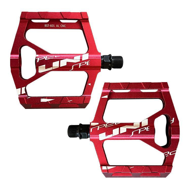 A pair of VTUVIA aluminum pedals, red