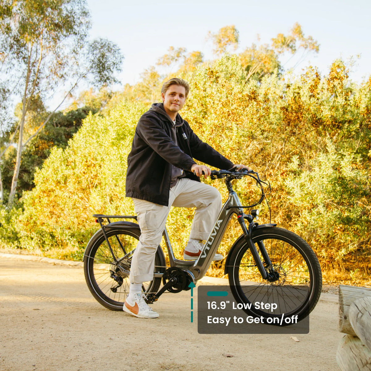Rider stepping over the low frame of a CMB in autumn light