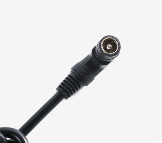 Close-up of the charger's round output plug