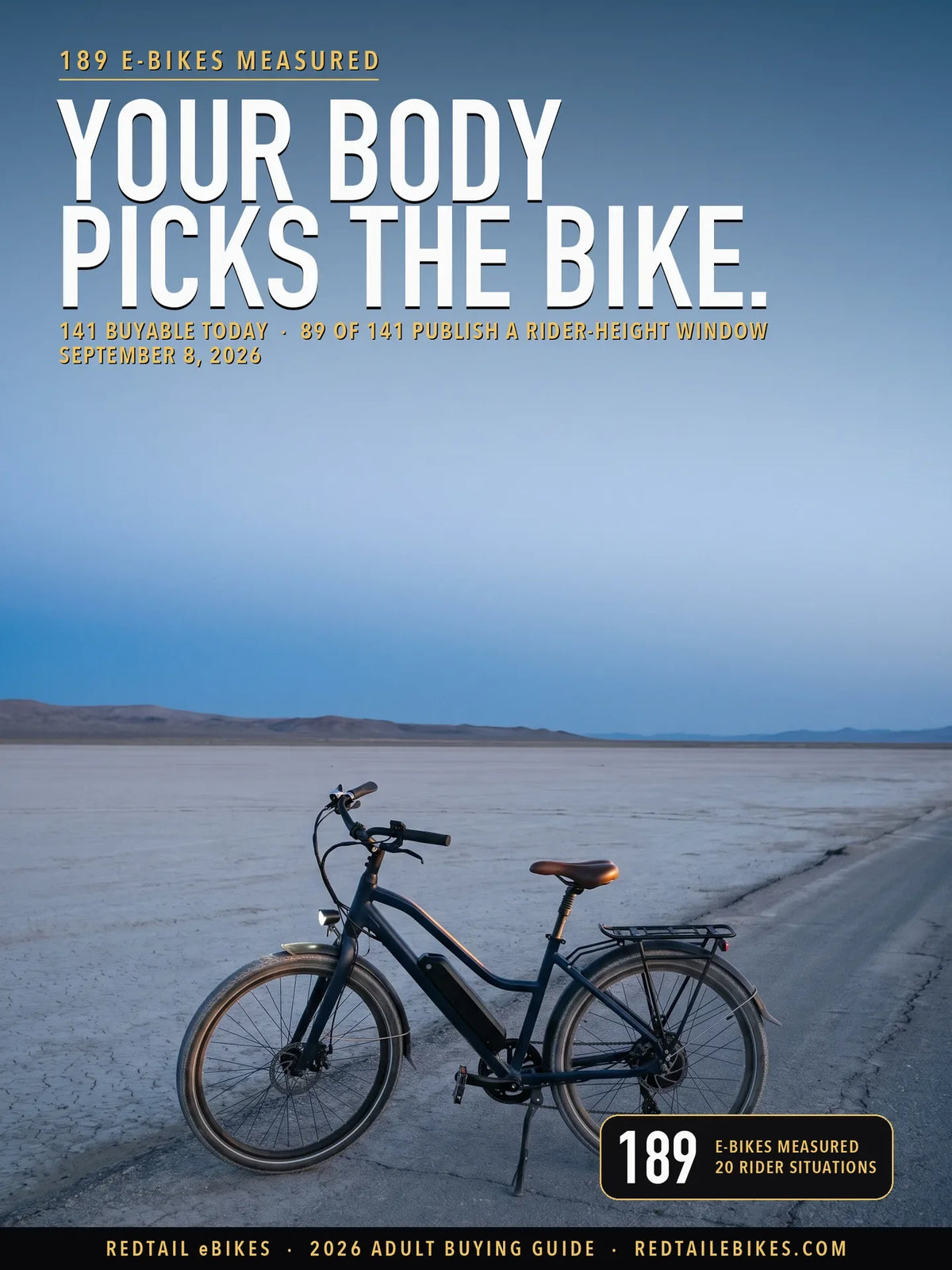 An adult rider on a step-through electric bike on a paved city path at dusk, the fitted headlight on and a loaded rear rack behind the saddle