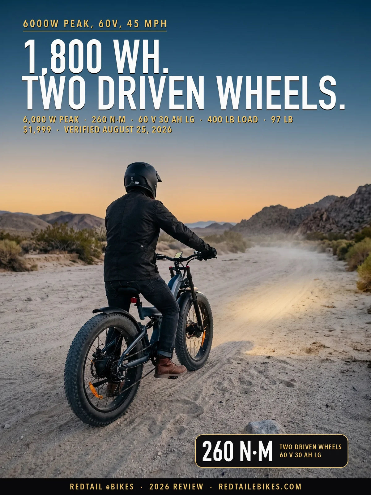 Freesky Warrior Ultra M-530 stopped in a sandy desert wash at dusk, rider seen from behind