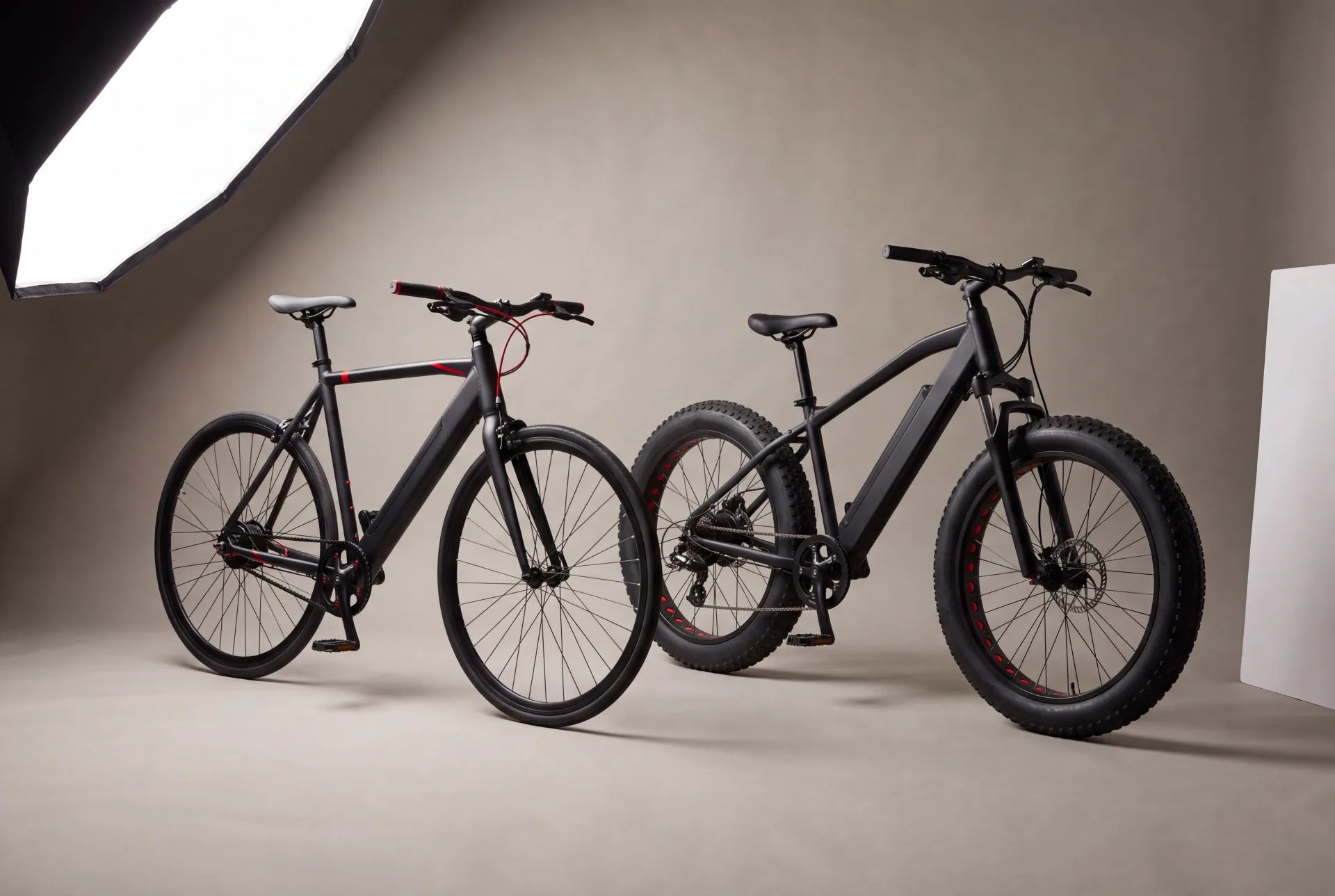 Commuter and fat-tire electric bikes side by side for a brand comparison