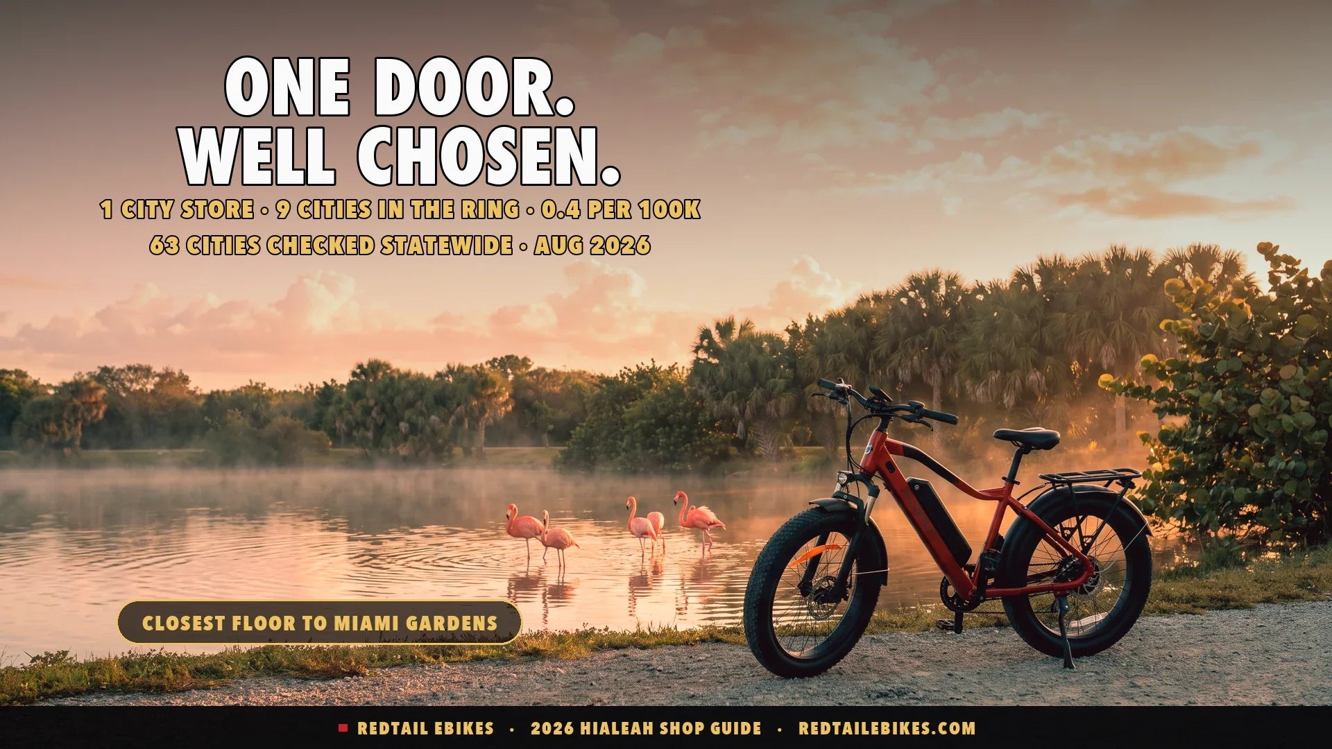 Electric bike on a lakeside path with a flock of flamingos wading in the water at golden hour near Hialeah