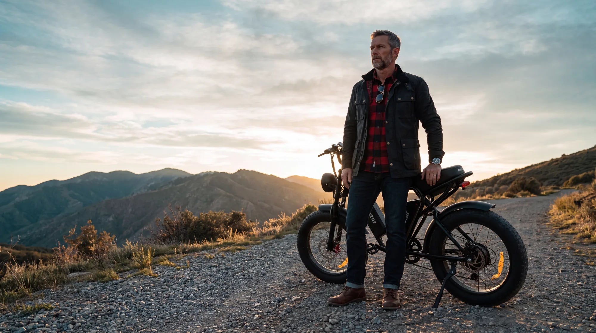 Ridstar fat-tire electric bike parked on a gravel trail at golden hour