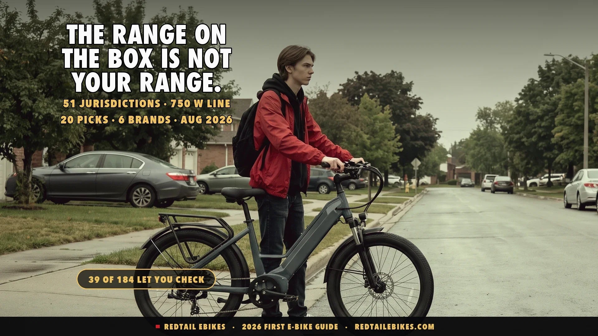 Teenager standing with a step-through commuter electric bike at the end of a suburban driveway on an overcast morning