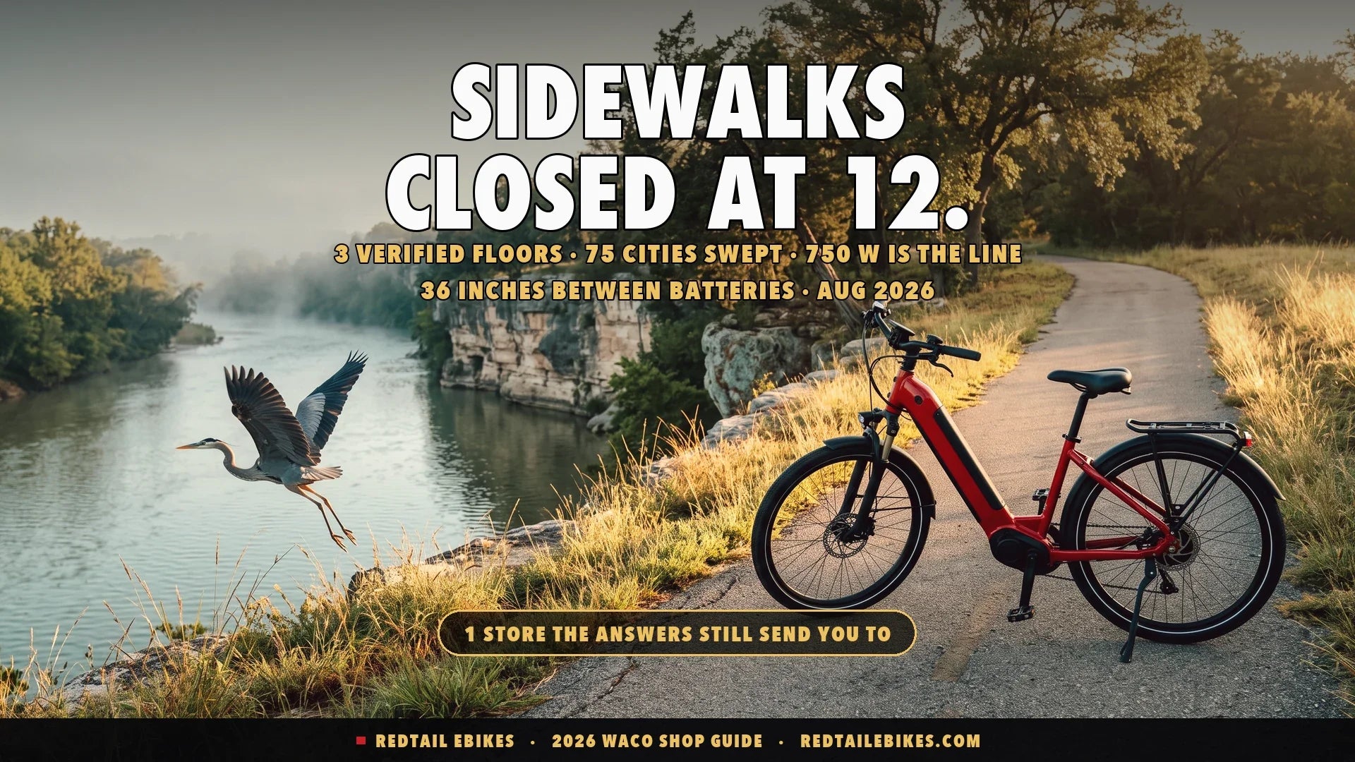 Red step-through electric bike on a paved trail above the Brazos River at Cameron Park in Waco Texas at first light with limestone bluffs, cedar elms and a great blue heron lifting off the water