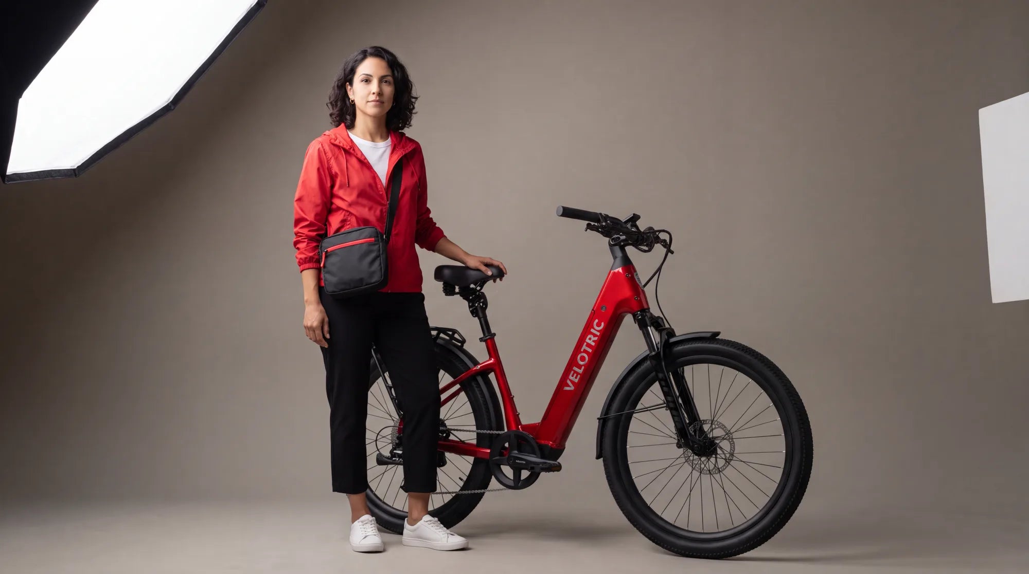 A modern step-through commuter e-bike representing the Velotric lineup, on a clean studio backdrop