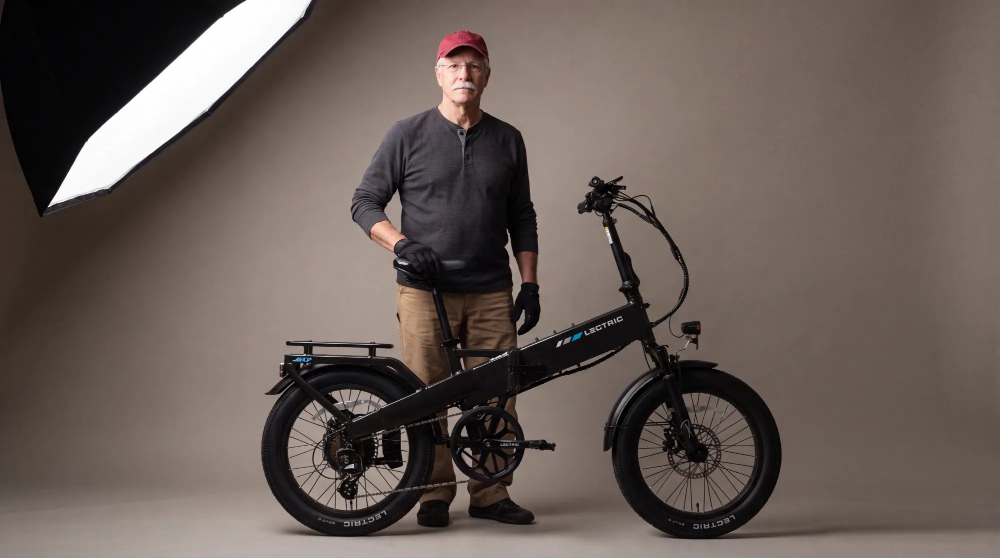 Lectric folding fat-tire electric bike shown against a plain studio background