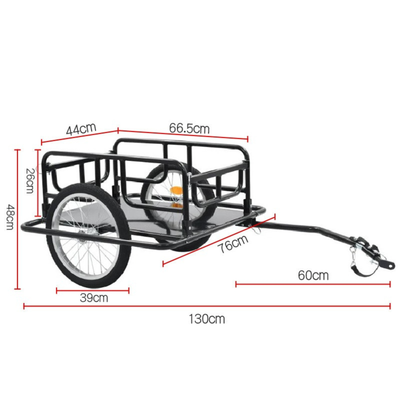 The trailer with its dimensions drawn: 130 cm long overall, a 66.5 by 44 cm bed, 48 cm tall