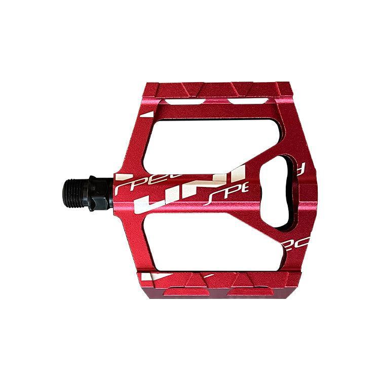 A red VTUVIA pedal, underside