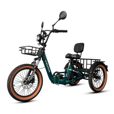 Green E-Cozy trike from the front, mirrors, headlight and front basket in view
