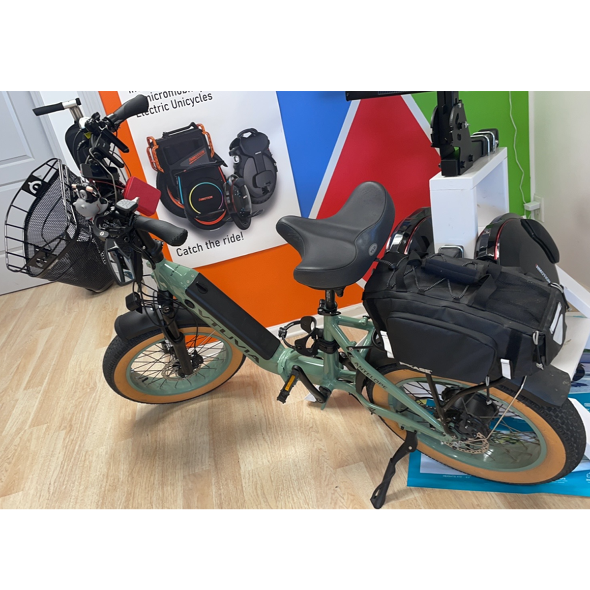 A green VTUVIA SX20 in a shop