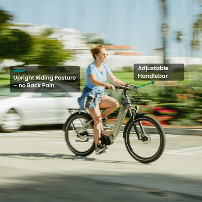 Rider on a silver CMB on a city street, upright posture