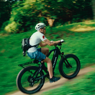 Rider on a Gemini on a wooded road