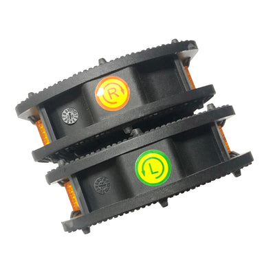 The pedals stacked, showing the R and L marks
