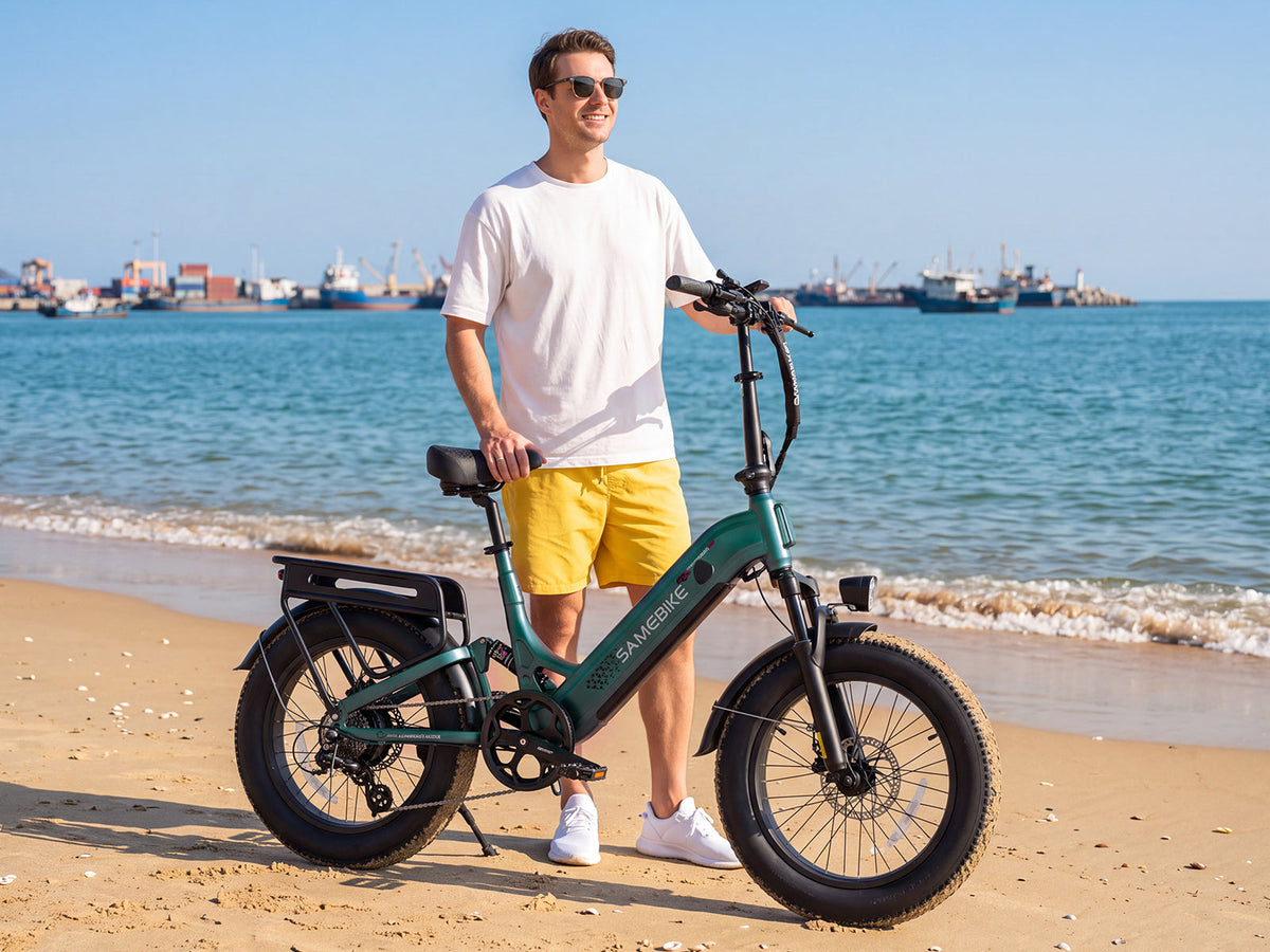 Samebike VOYAGER in Dark Green parked on a beach